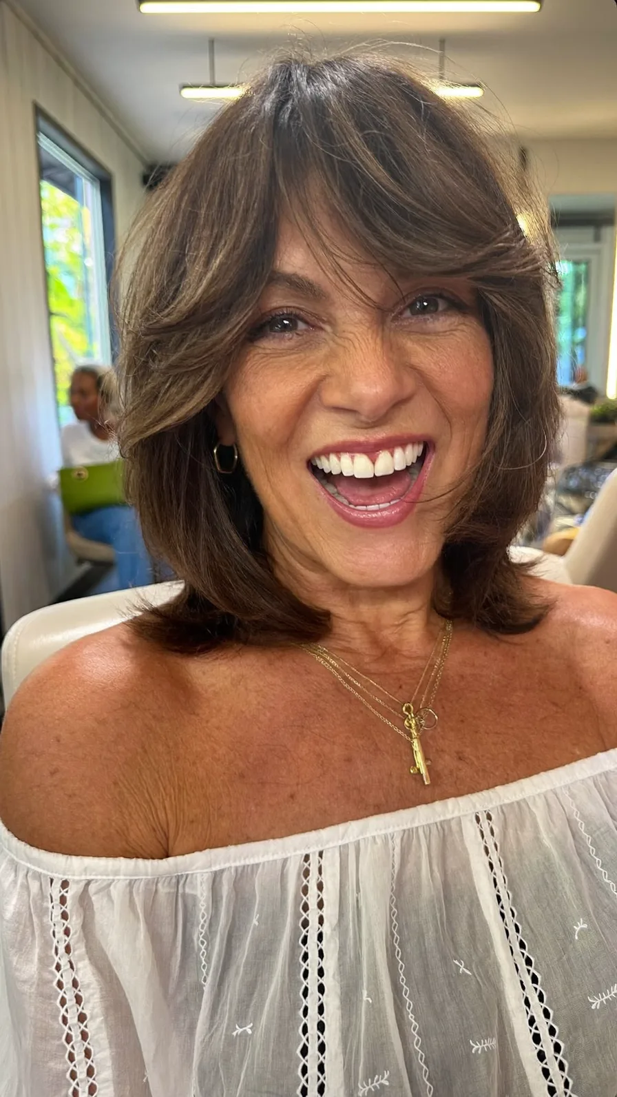 Classic Layered Chin-Length Hair with Side-Swept Bangs