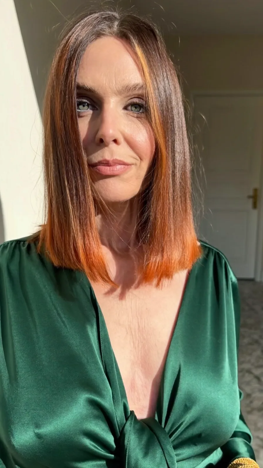 Modern Two-Tone Blunt Bob with Vibrant Copper Orange Ends