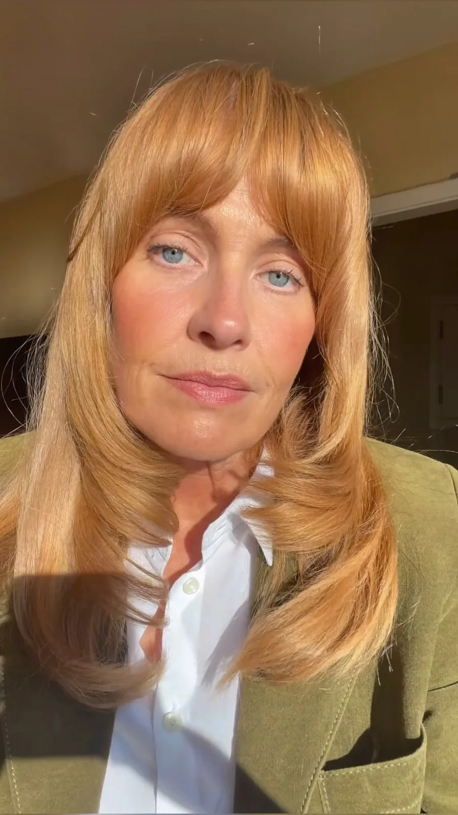 Soft Long Layers with Curtain Bangs and Feathered Edges