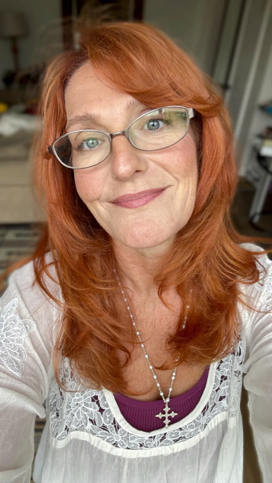 Soft Flowing Copper Red Long Layers with Side-Swept Bangs