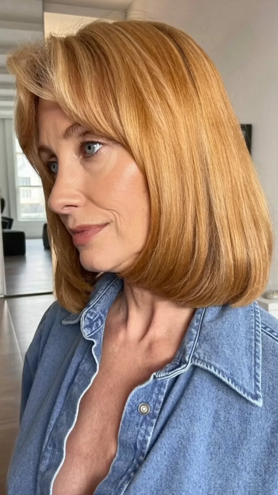 Classic Warm Golden Blonde Rounded Bob with Curtain Bangs
