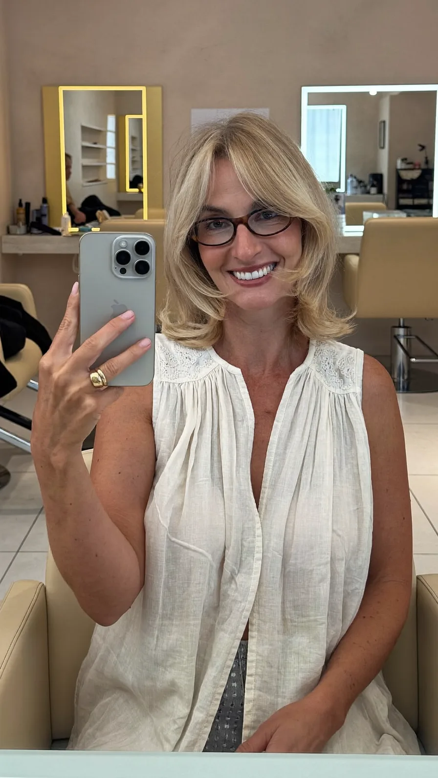 Soft Shoulder-Length Layers with Flowing Curtain Bangs