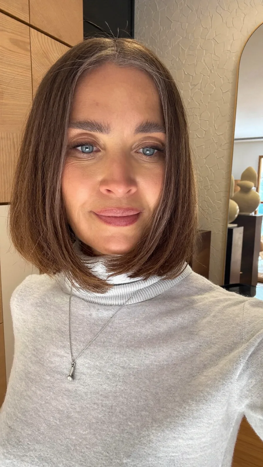 Chic Center-Parted Blunt Bob with Natural Medium Ash Brown Hue