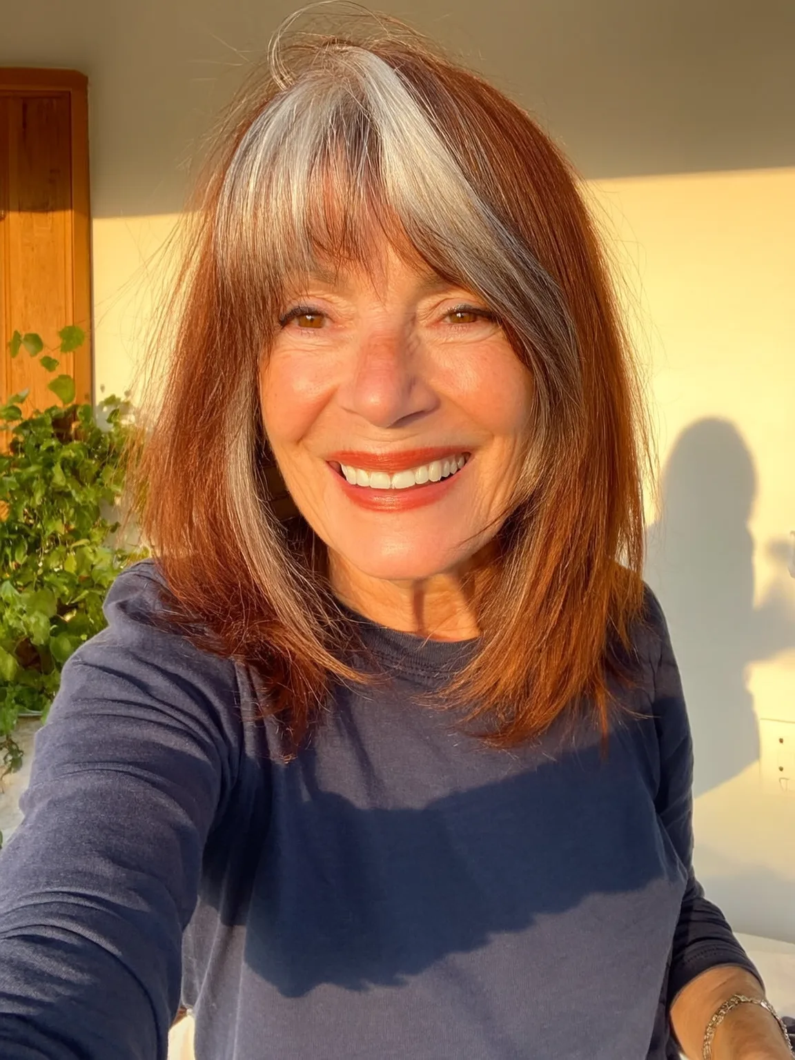 Auburn Lob with Silver Front Highlights and Wispy Bangs