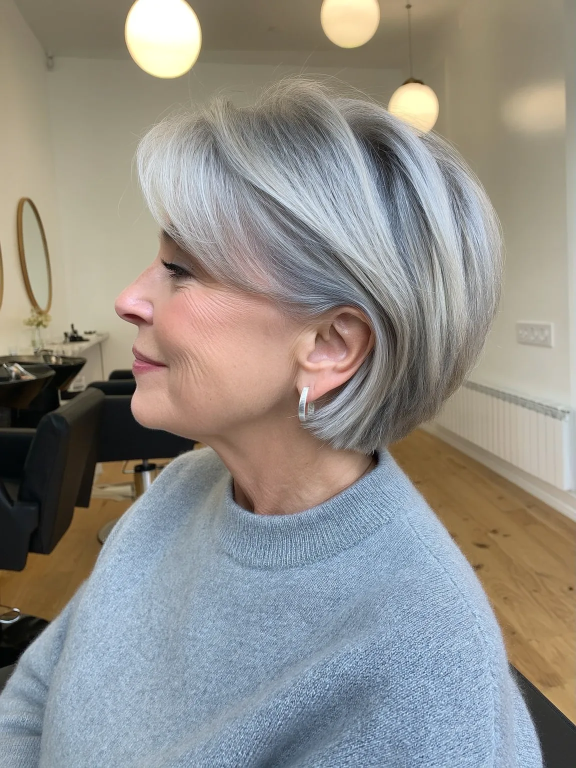 Short Silver Frost Bob with Sleek Side-Swept Bangs