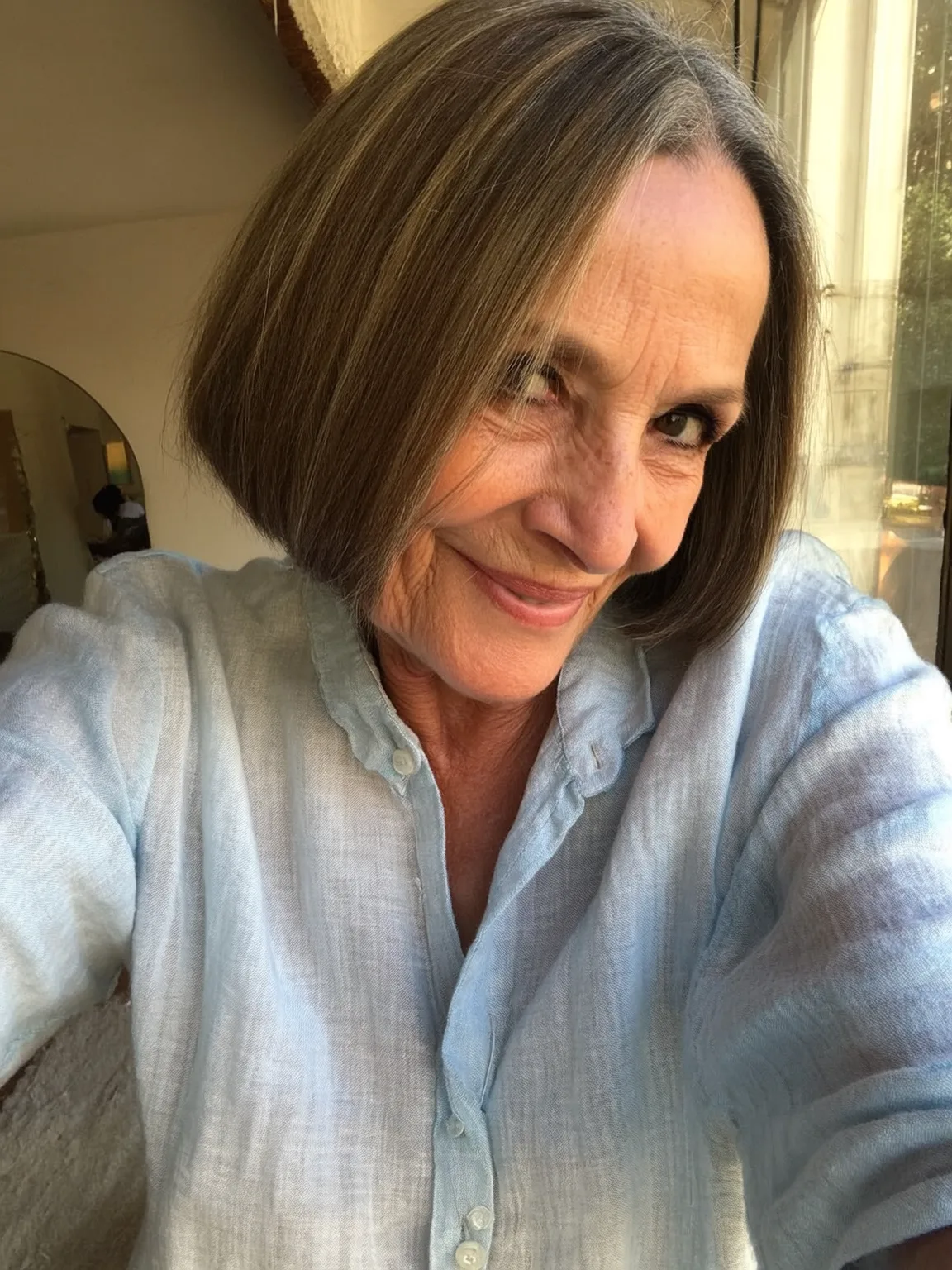 Ash Brown Chin-Length Bob with Subtle Highlights