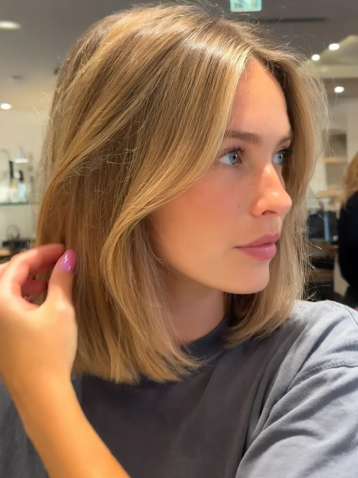Sandy Blonde Shoulder-Length Lob with Sleek Finish