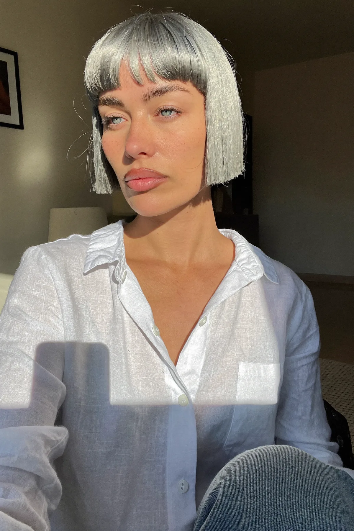 Sleek Silver Chin-Length Bob with Full Fringe Bangs
