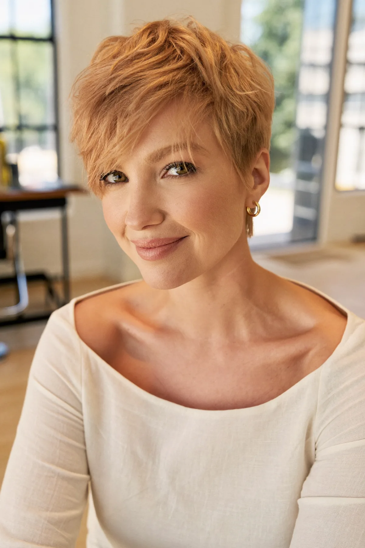 Sleek Straight Strawberry Blonde Pixie Cut with Solid Copper Tones
