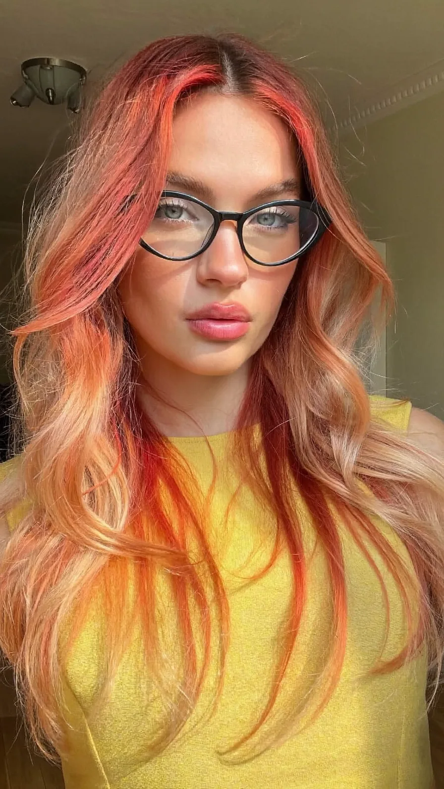 Voluminous Striking Strawberry Blonde Long Layered Waves