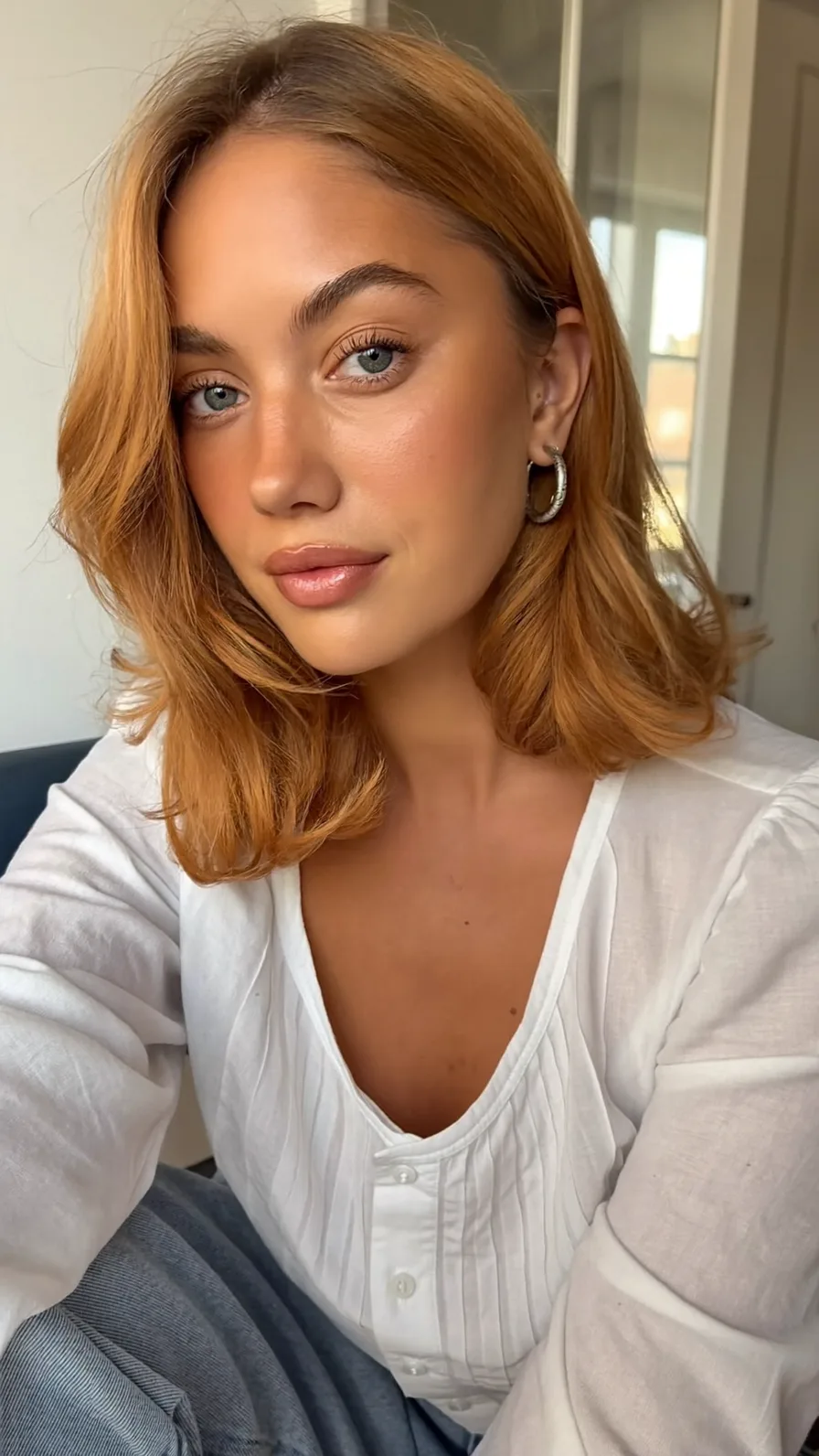 Warm Copper Shoulder-Length Hair with Side-Swept Layers