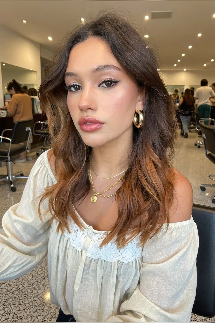 Voluminous Layered Shoulder-Length Caramel Brown Haircut With Soft Waves
