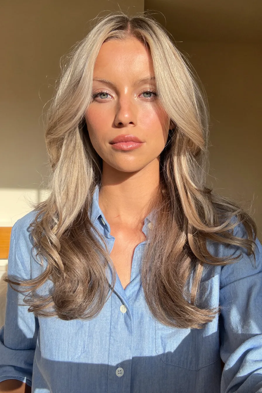 Softly Layered Ash Blonde Shoulder-Length Cut with Face Framing