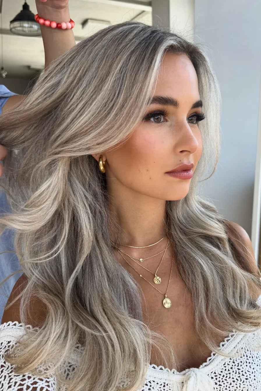 Chic Face-Framing Layers for Shoulder-Length Ash Blonde Hair