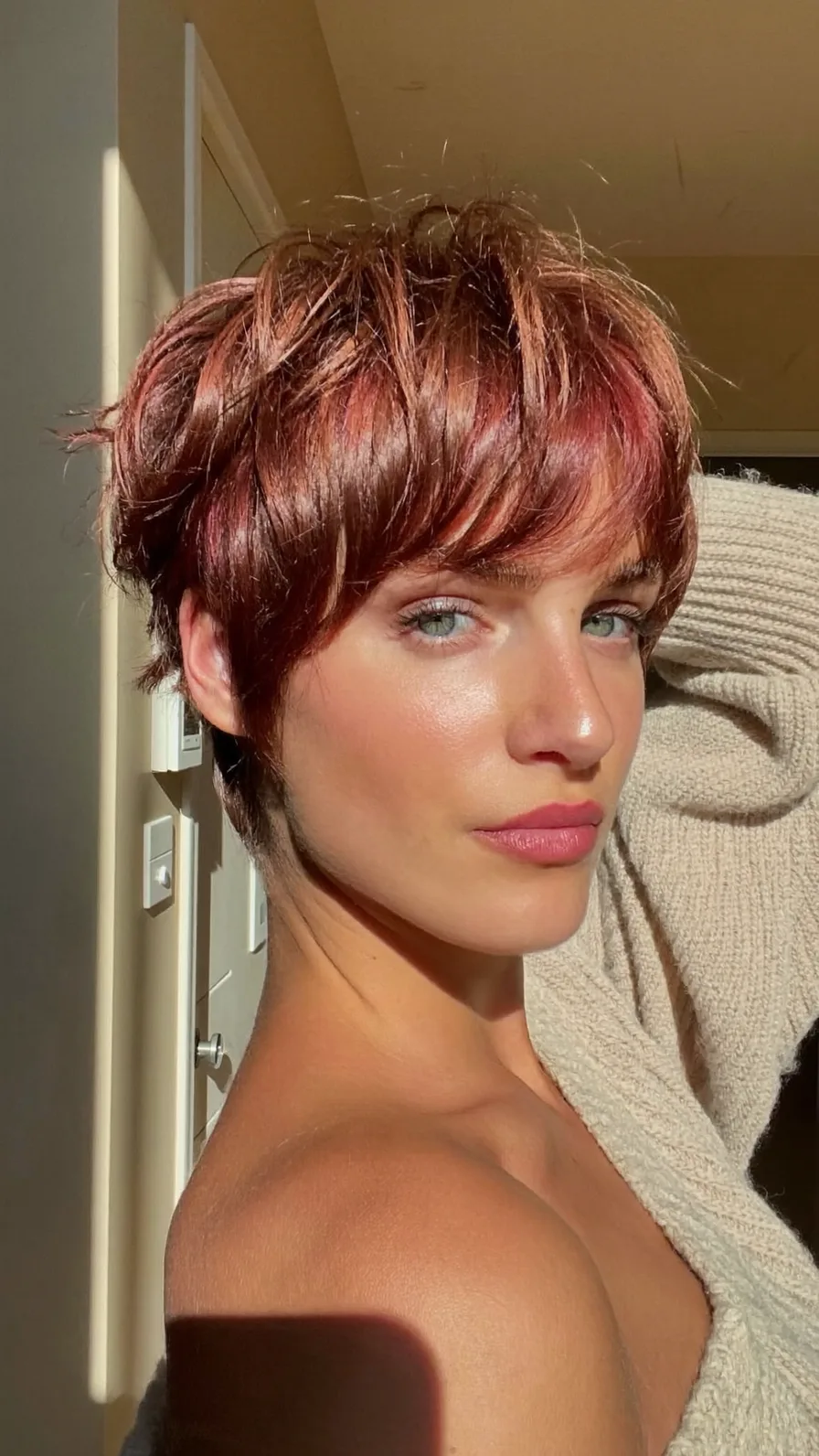 Textured Auburn Tousled Pixie with Side-Swept Bangs Style