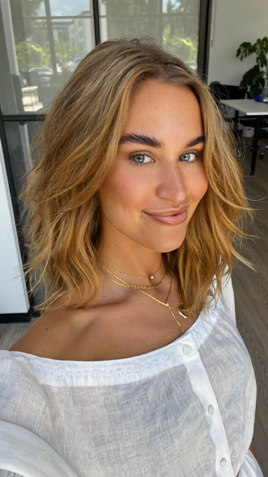 Tousled Shoulder-Length Long Layers with Balayage Highlights
