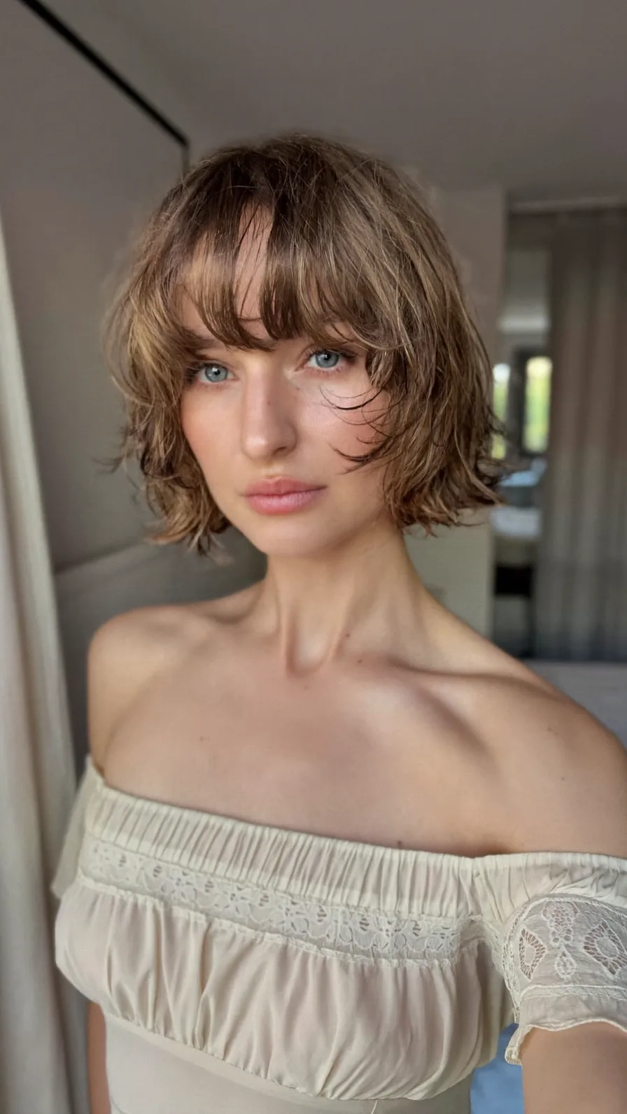 Tousled Chin-Length Shag with Soft Curtain Bangs
