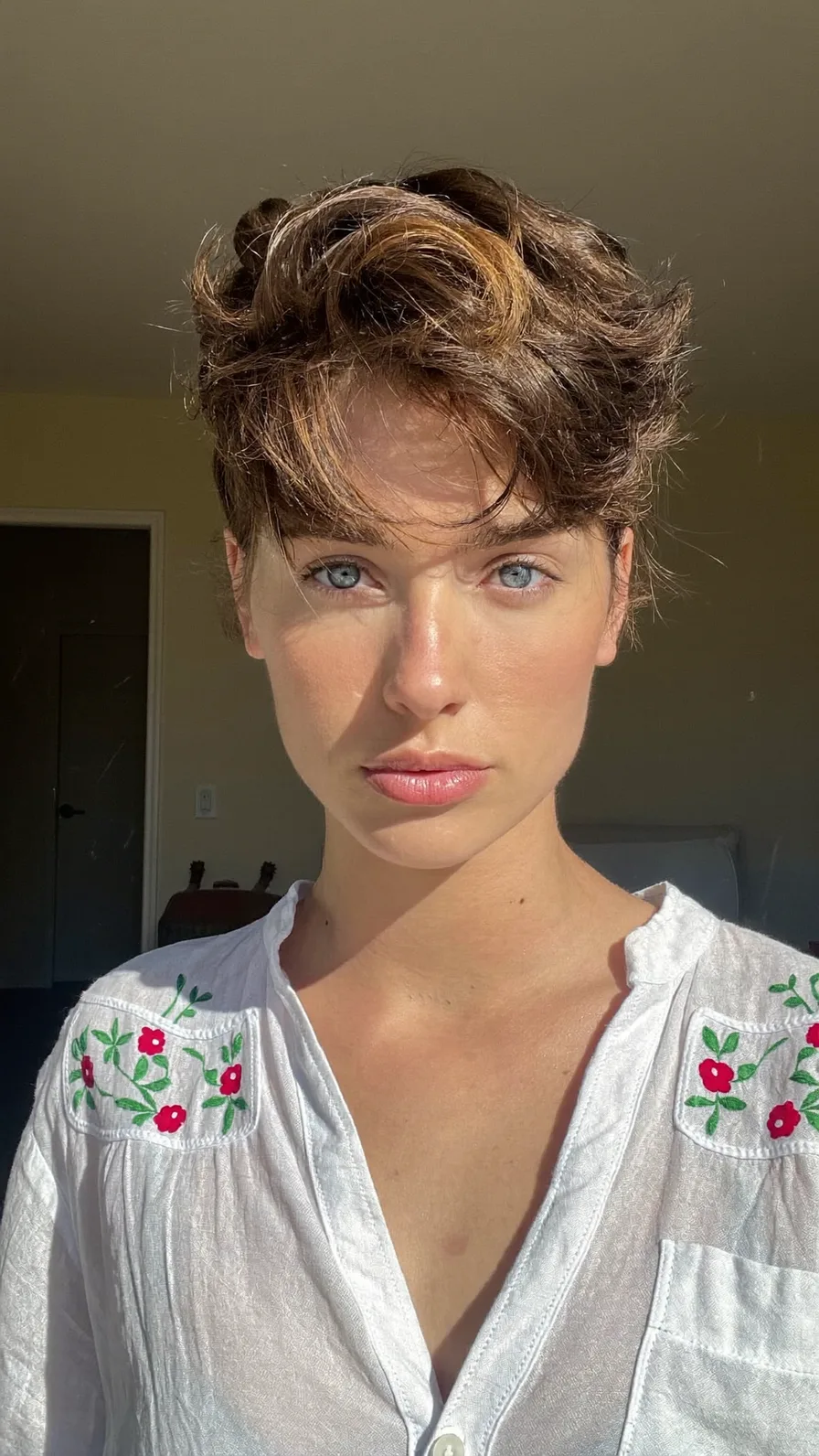 Voluminous Textured Pixie Cut with Tousled Curtain Bangs