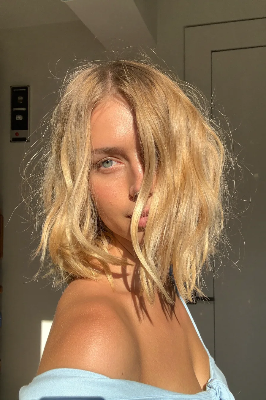 Modern Tousled Lob with Warm Honey Blonde Balayage Waves