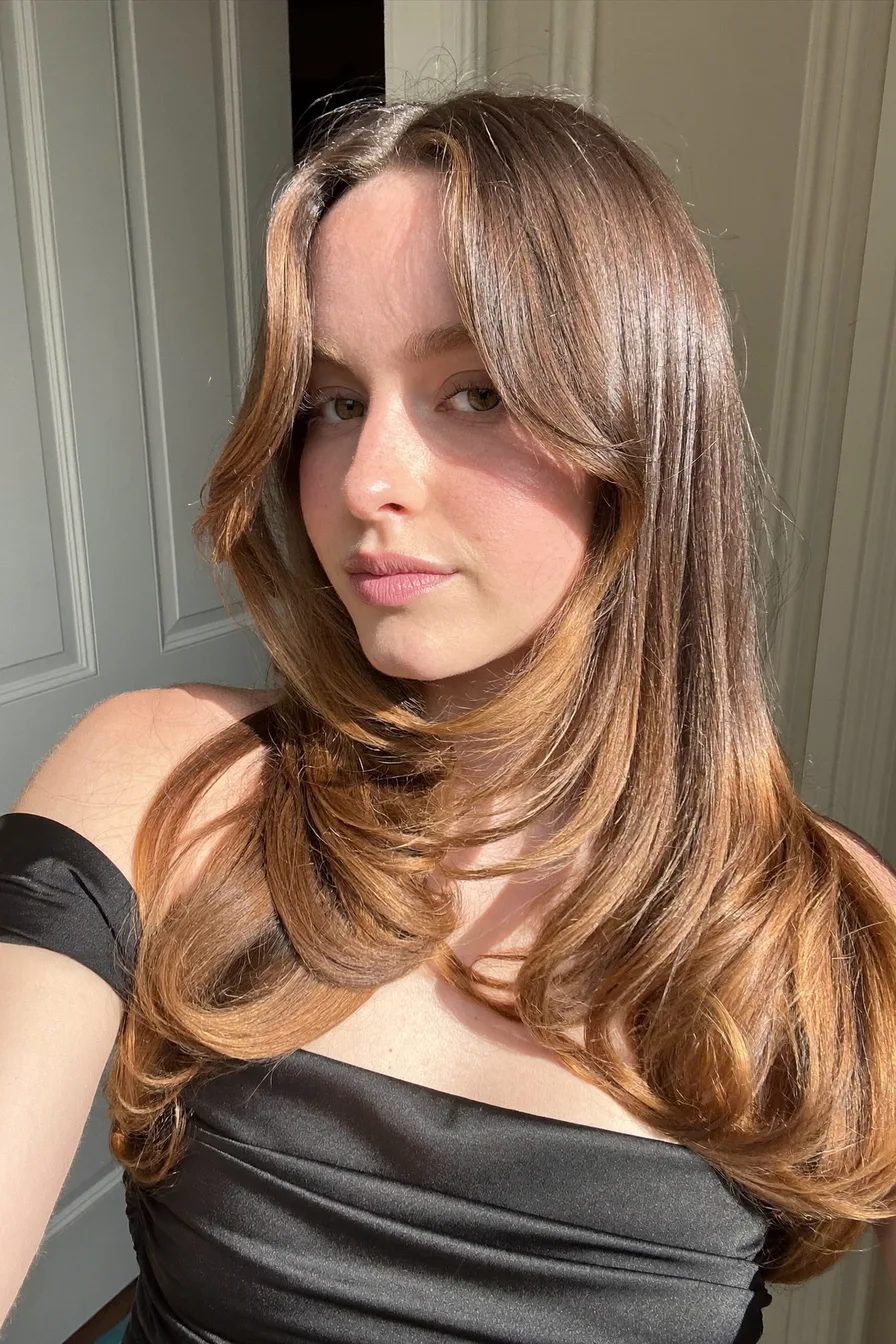 Chic Straight Long Layered Cut with Effortless Curtain Bangs Shine
