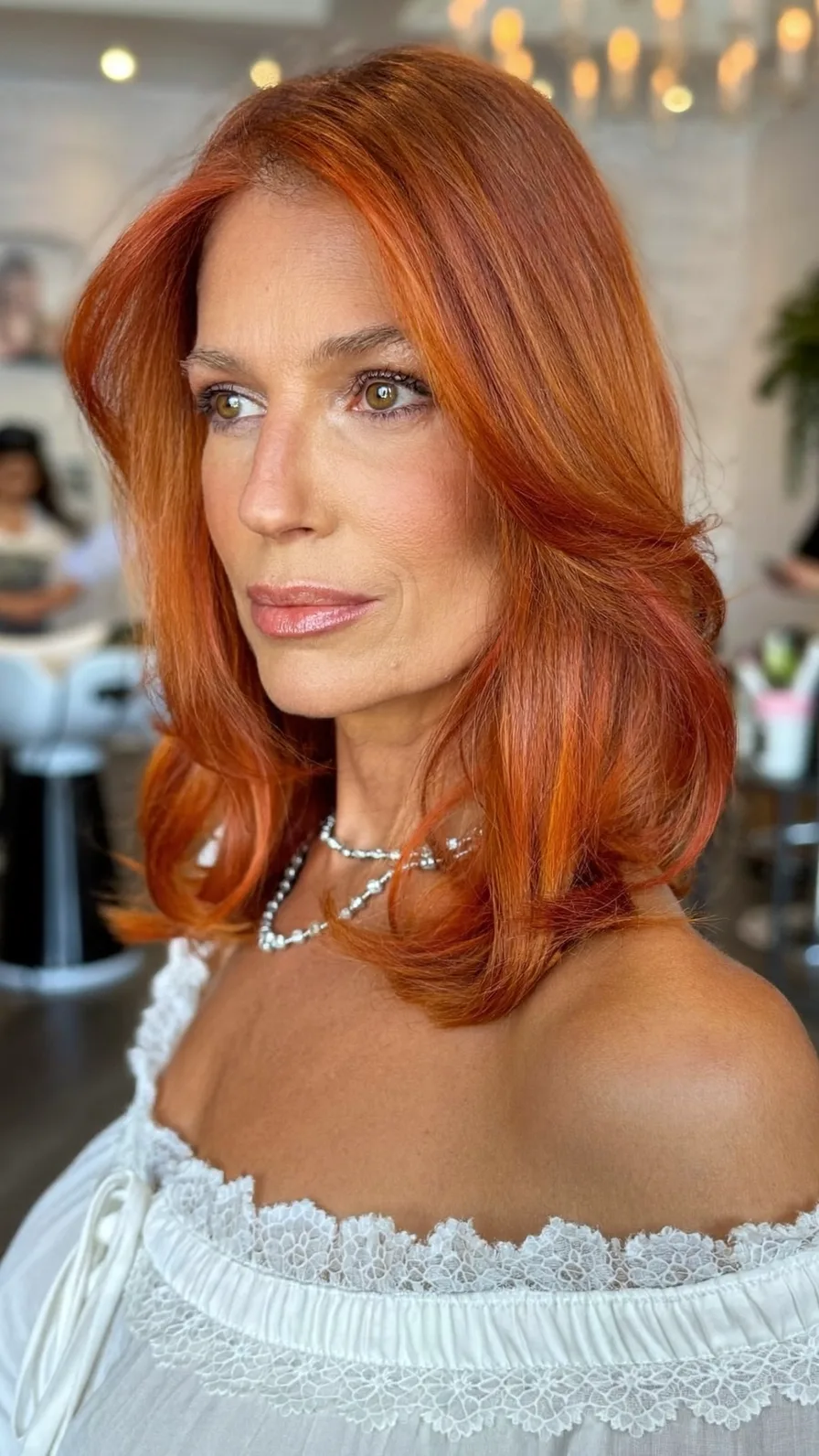 Vibrant Copper Red Shoulder-Length Long Layered Hairstyle