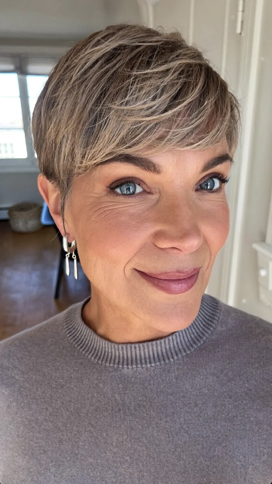 Elegant Ash Blonde Pixie with Textured Side-Swept Bangs