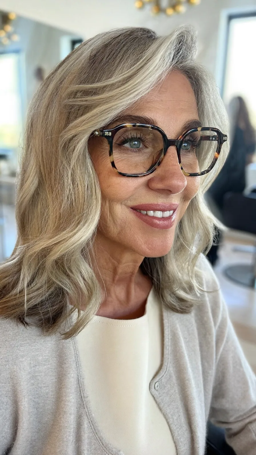 Elegant Medium-Length Soft Layered Wavy Hairstyle for Mature Women