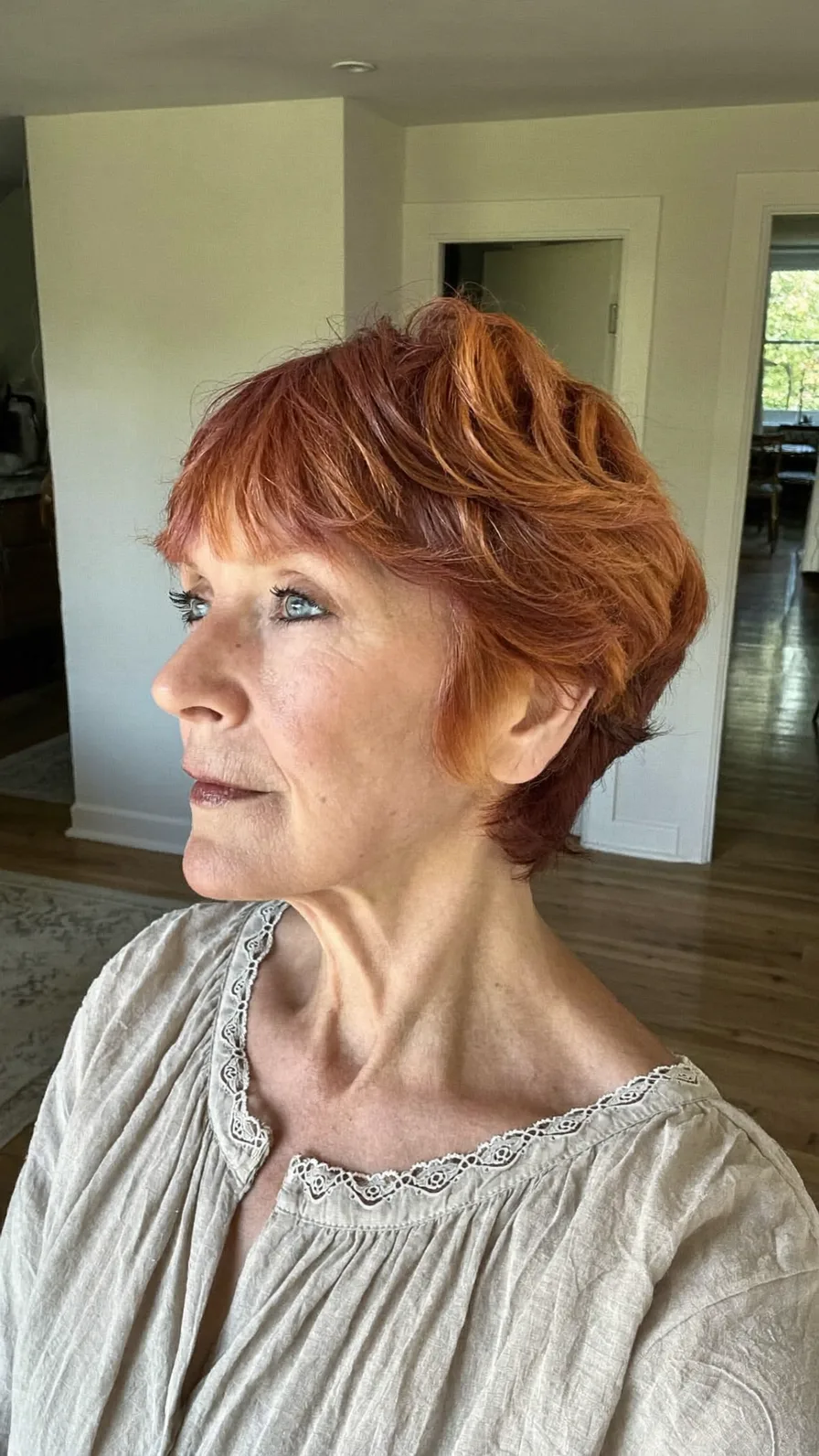 Elegant Short Layered Copper Hair with Textured Wispy Bangs
