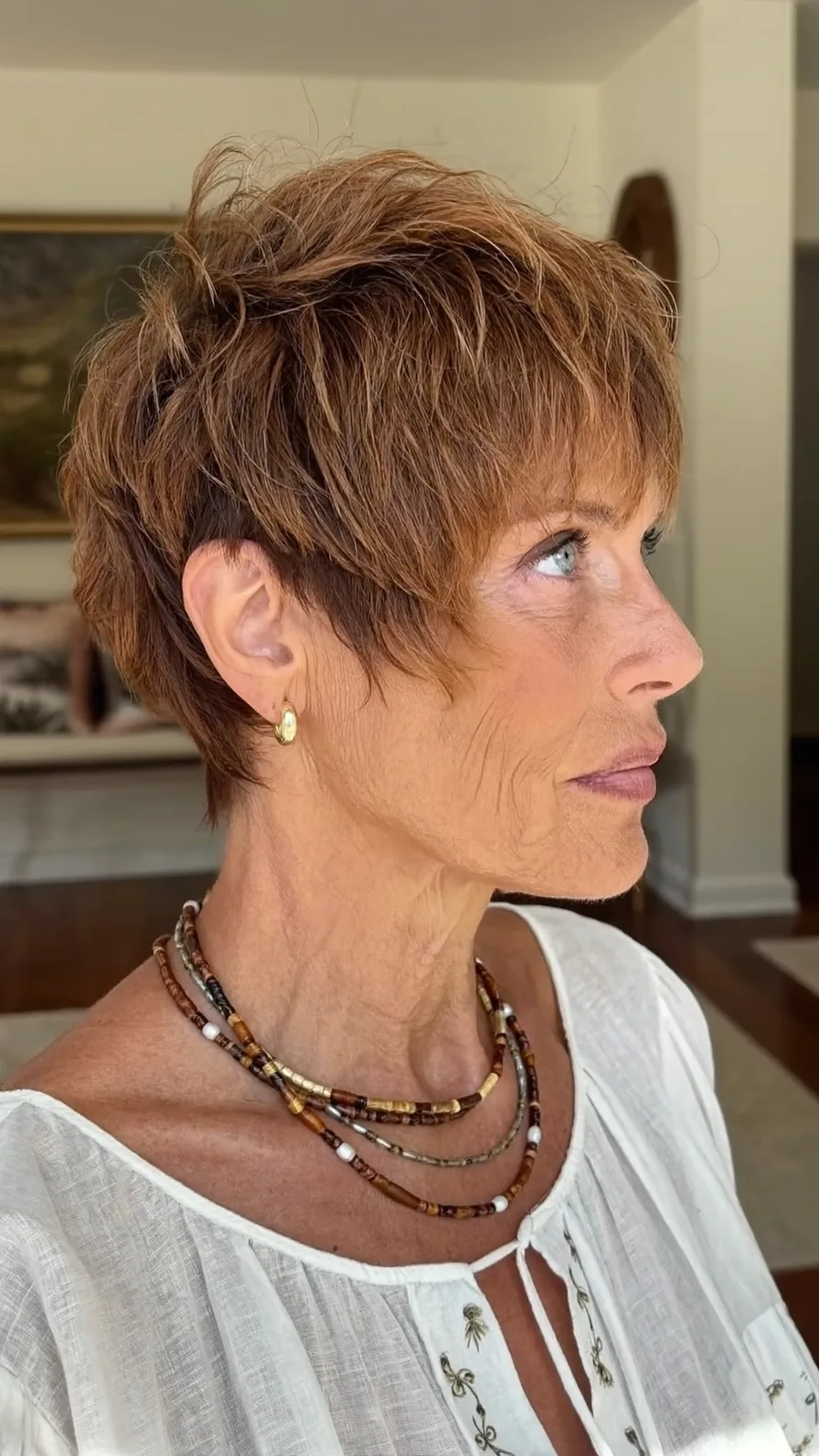 Modern Textured Pixie with Warm Reddish Brown Color
