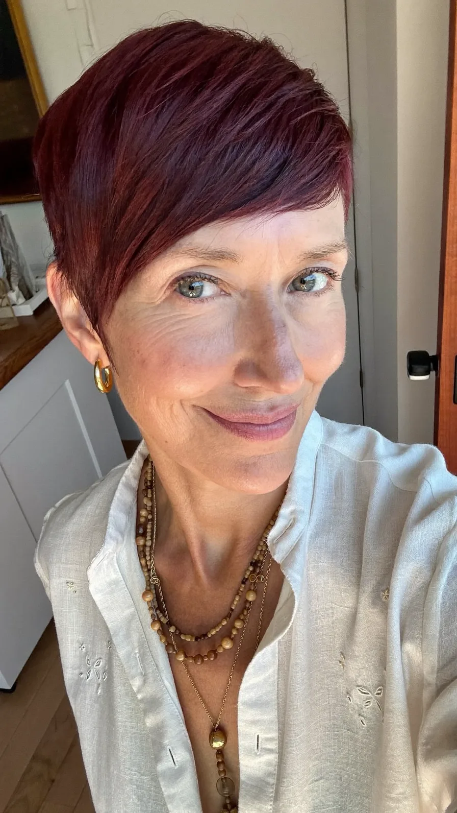 Modern Sleek Deep Burgundy Pixie Cut with Side-Swept Bangs