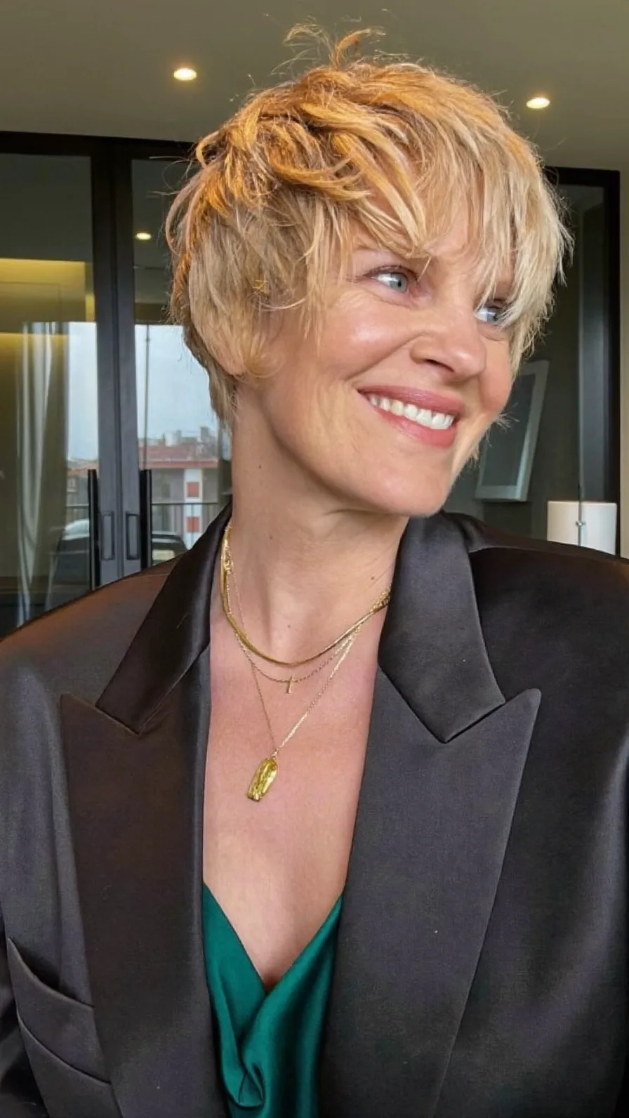 Textured Warm Honey Blonde Pixie with Side-Swept Bangs