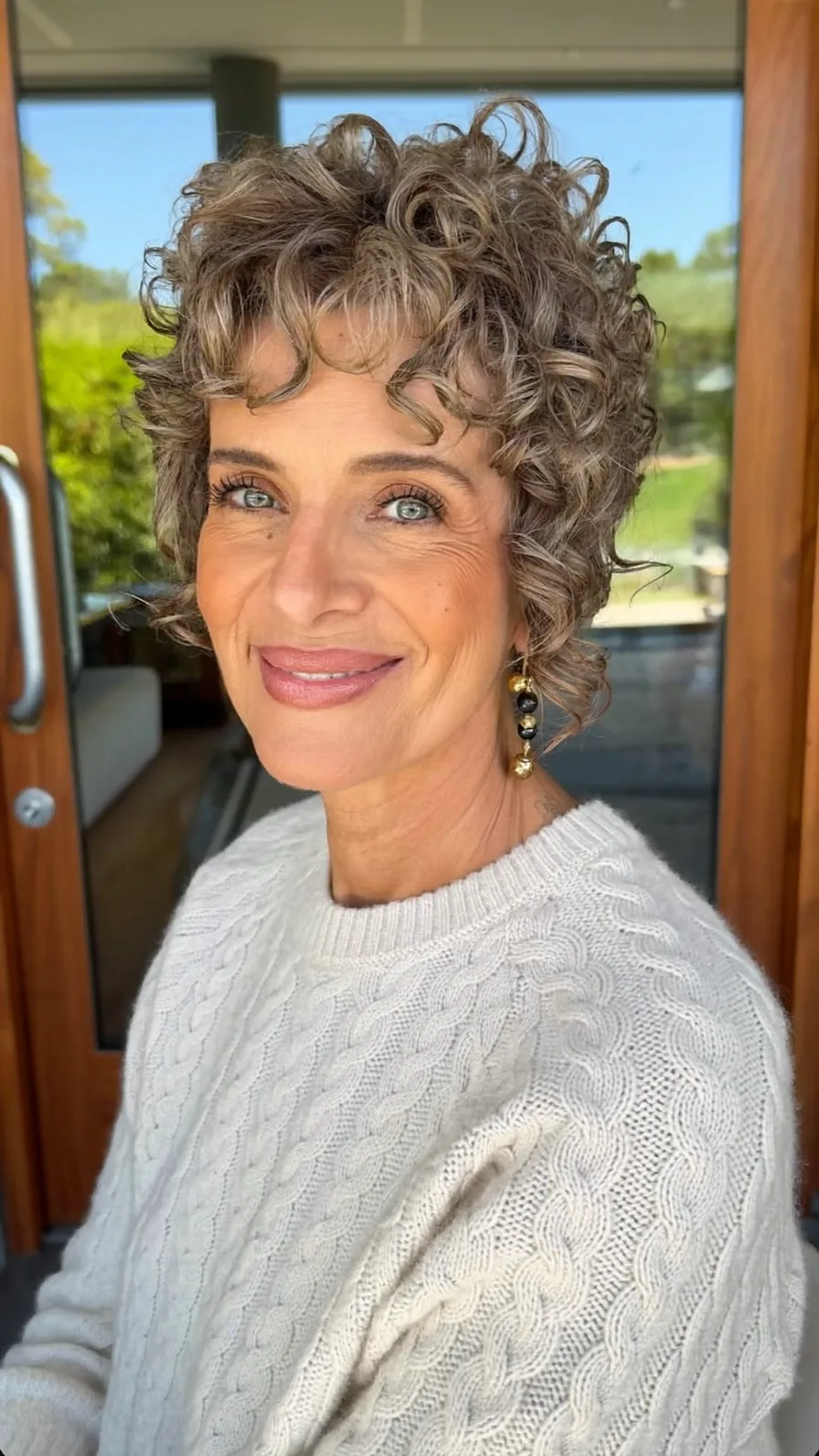 Voluminous Textured Curly Pixie with Soft Curtain Bangs