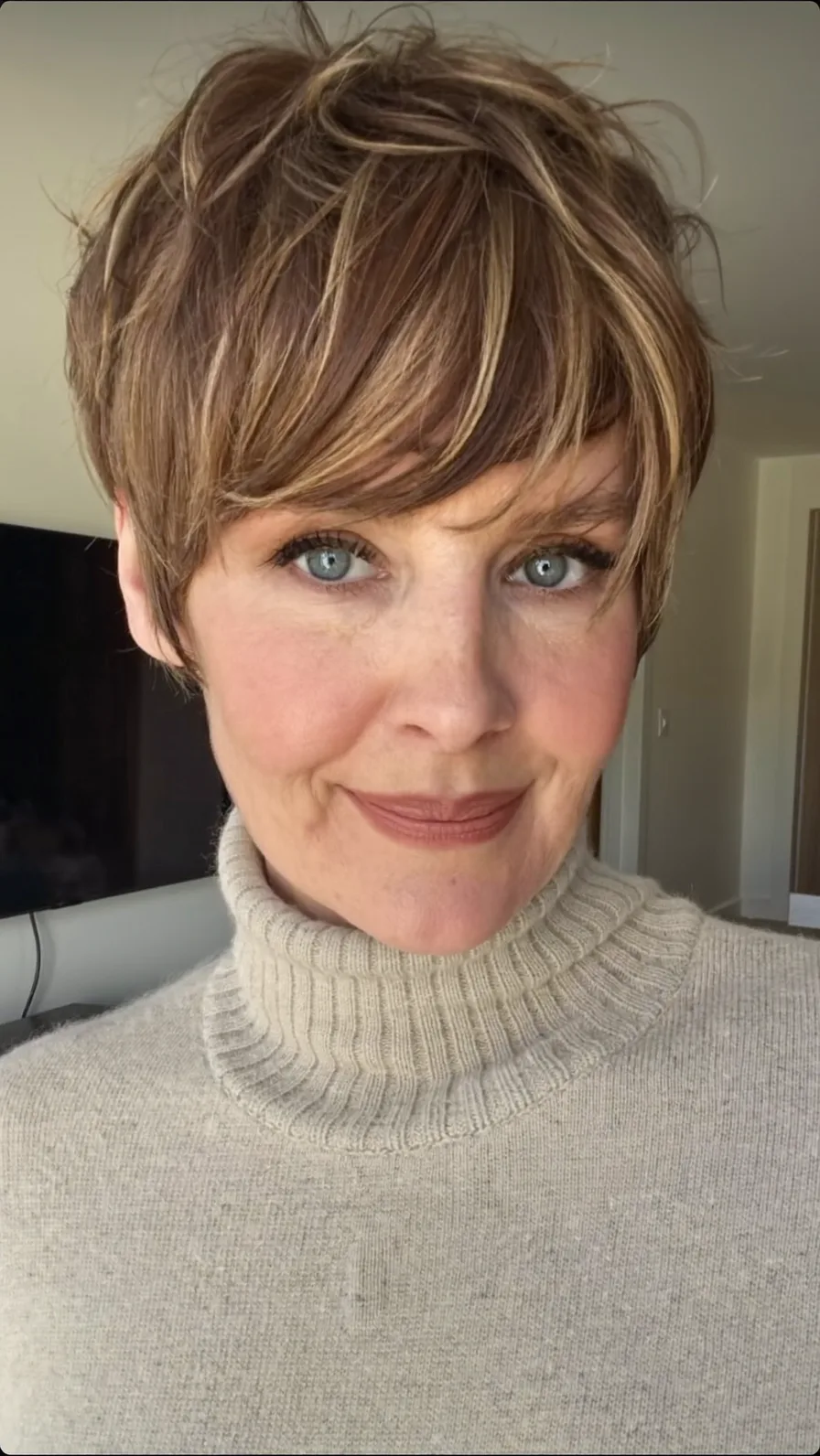 Textured Pixie Cut with Side-Swept Highlights for Volume
