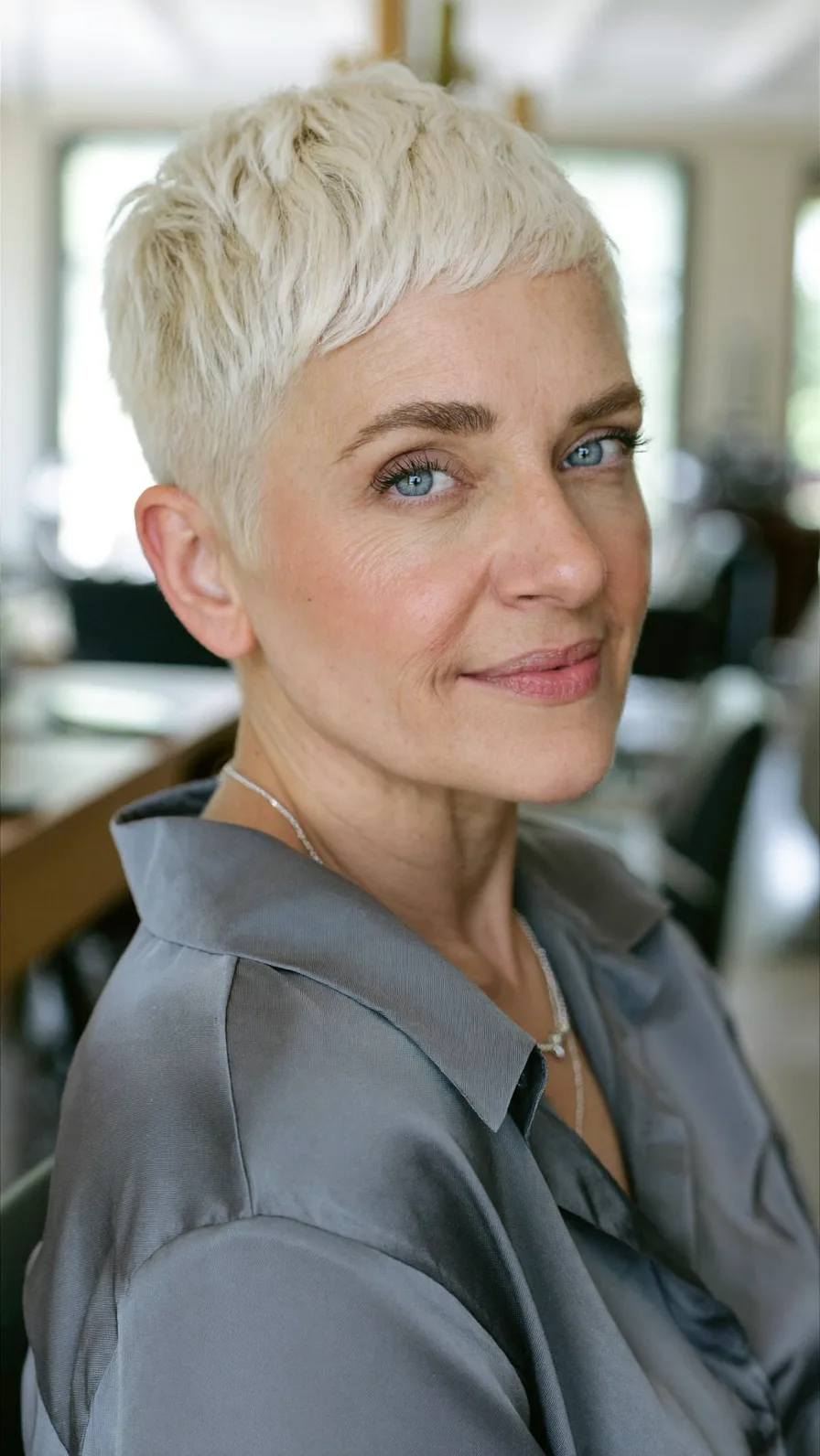 Textured Platinum Blonde Pixie with Micro Bangs for Oval Faces