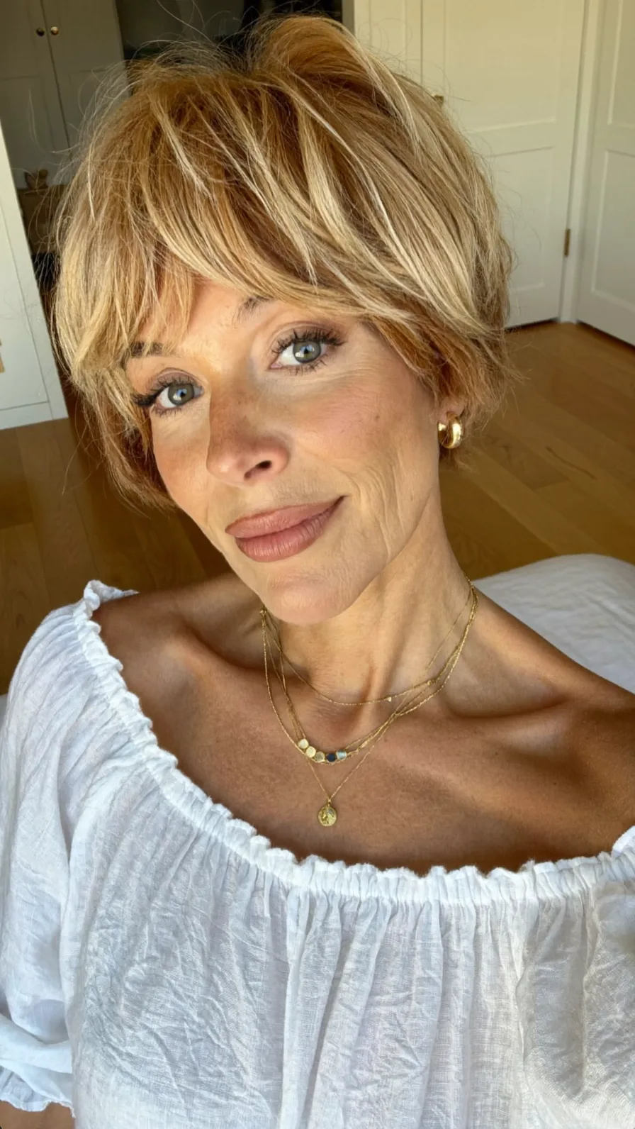 Textured Short Layered Bob with Warm Blonde Highlights