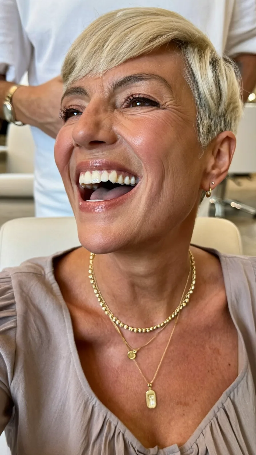 Chic Short Textured Platinum Blonde Pixie with Side Bangs
