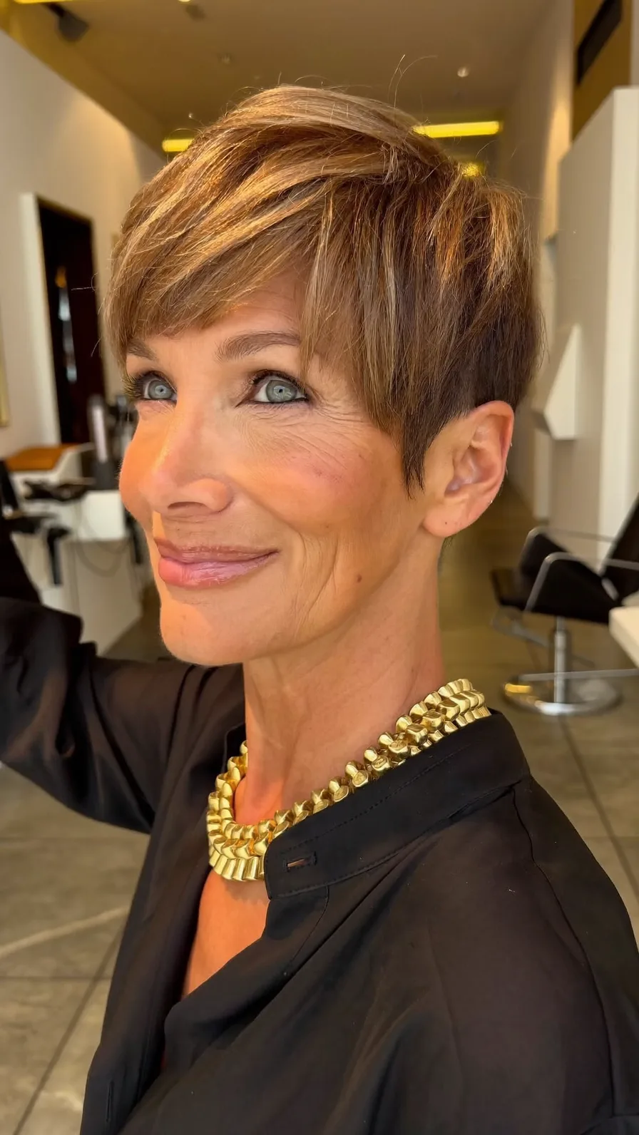 Chic Short Pixie Cut with Warm Honey Highlights