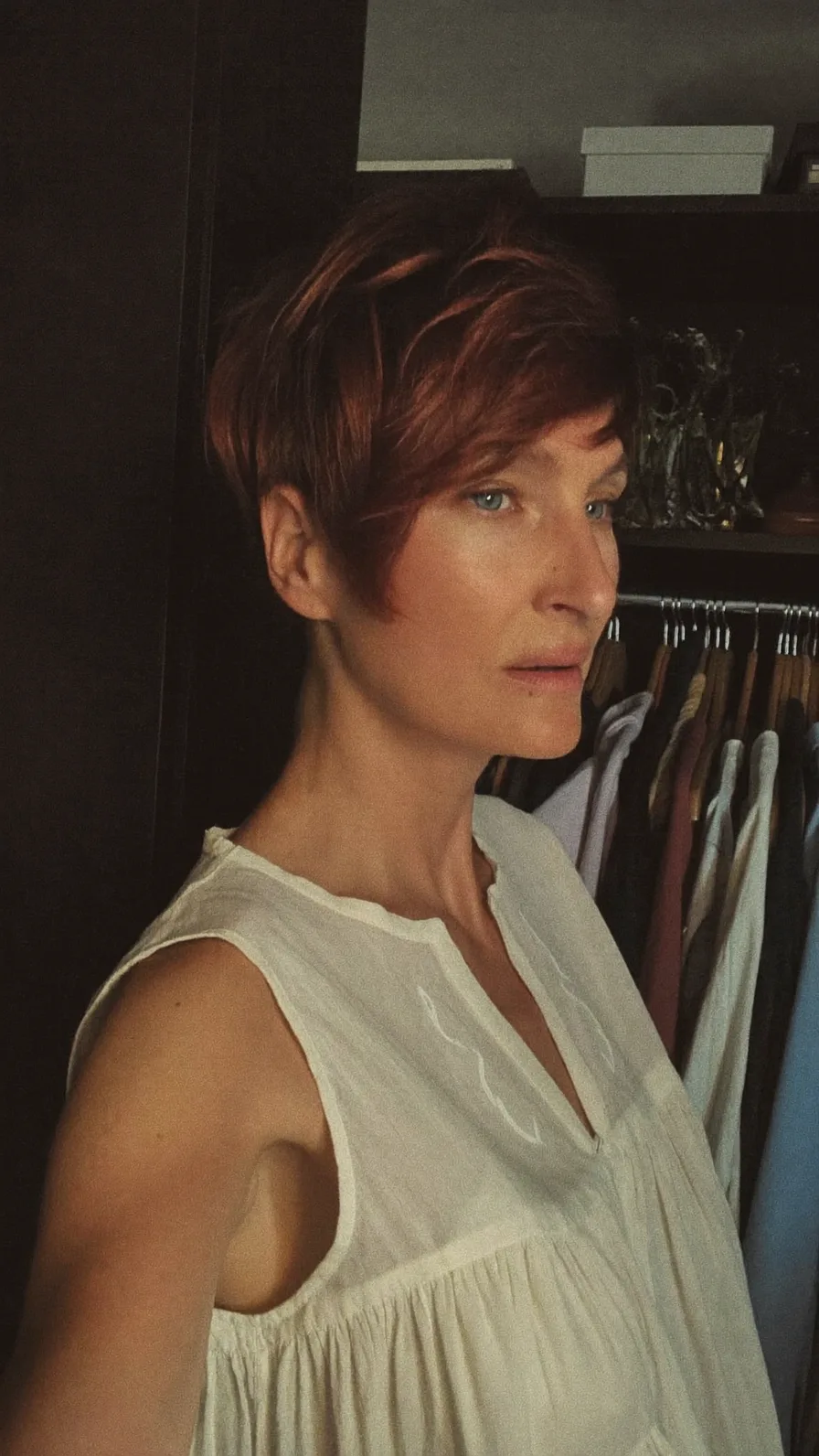 Classic Auburn Pixie Cut with Textured Side-Swept Bangs
