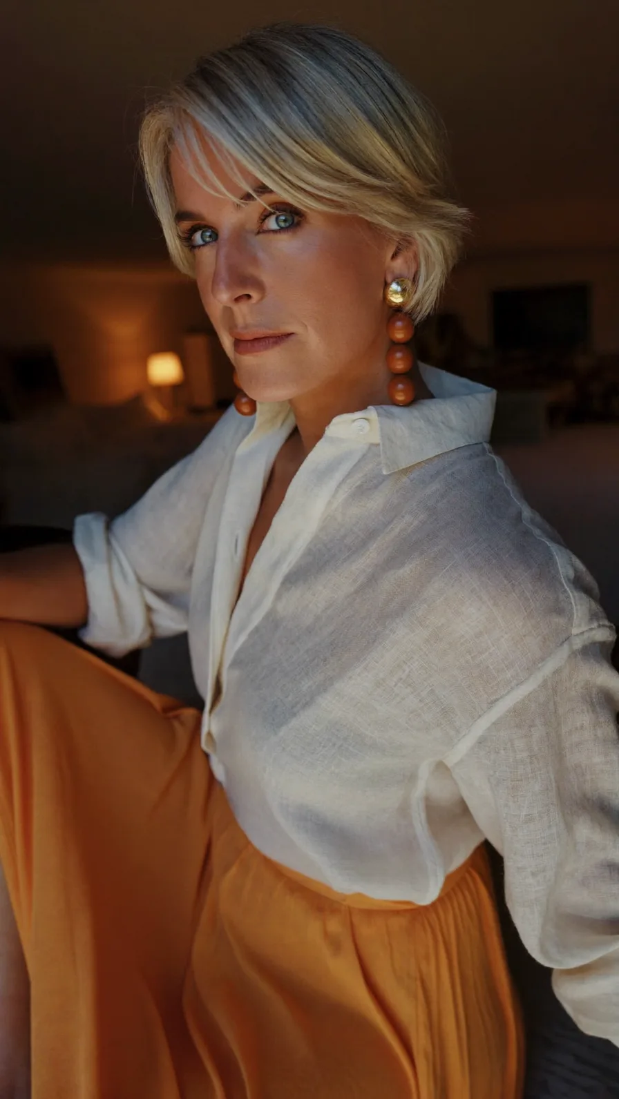 Elegant Short Layered Cut with Feathered Curtain Bangs