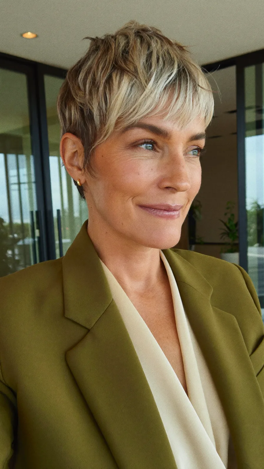 Modern Textured Pixie Cut with Cool Blonde Highlights