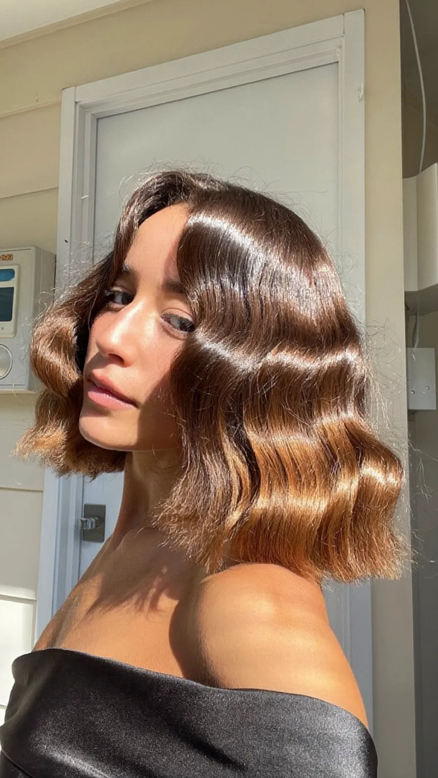 Glossy Wavy Chin-Length Bob with Center Curtain Bangs