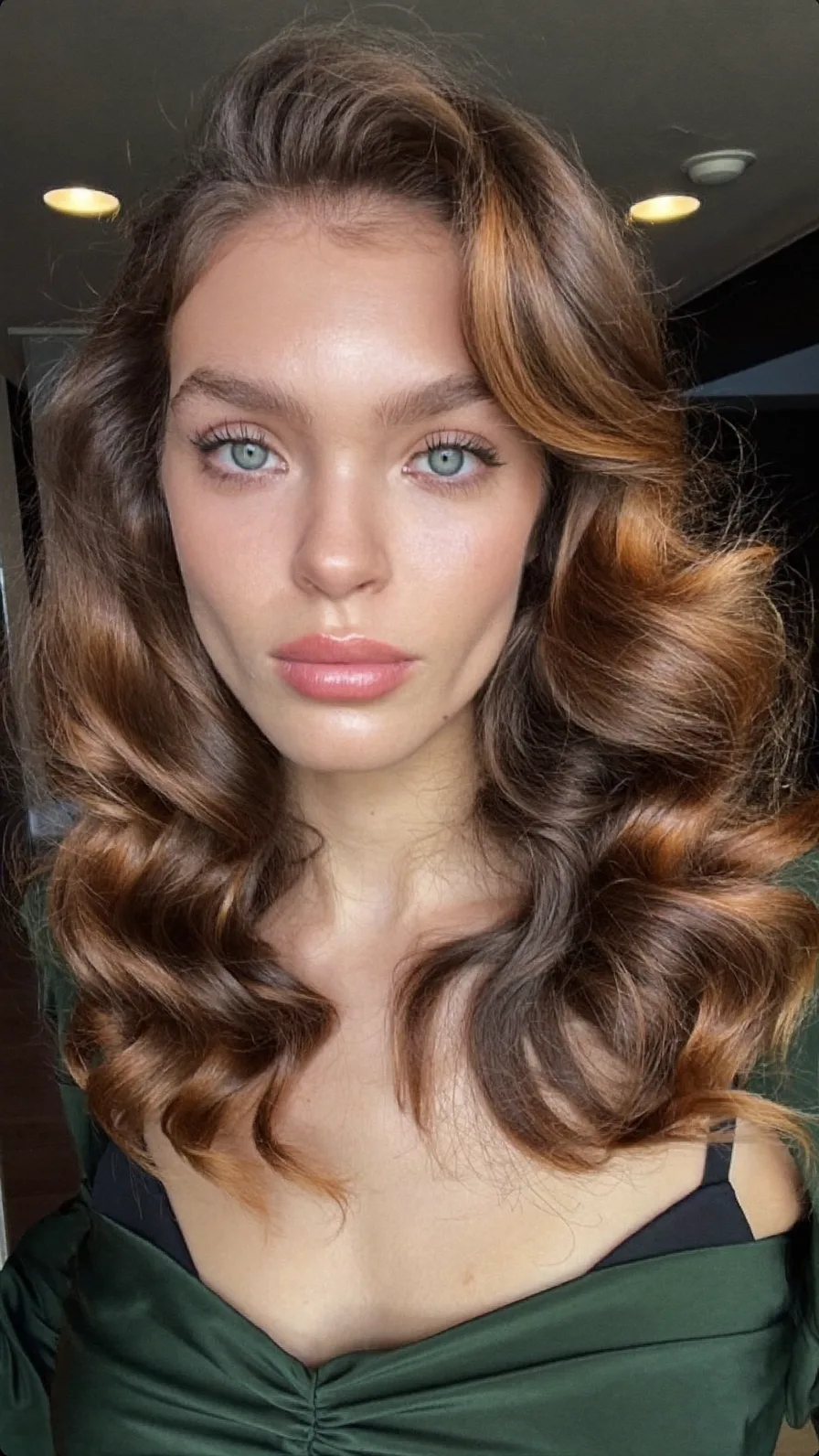 Voluminous Side-Swept Medium Waves with Caramel Highlights