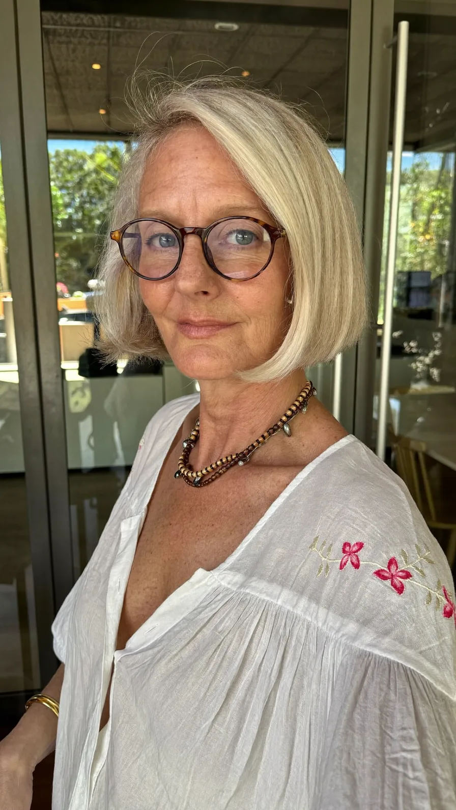 Sleek Cool Platinum Blonde Blunt Bob with Side Part