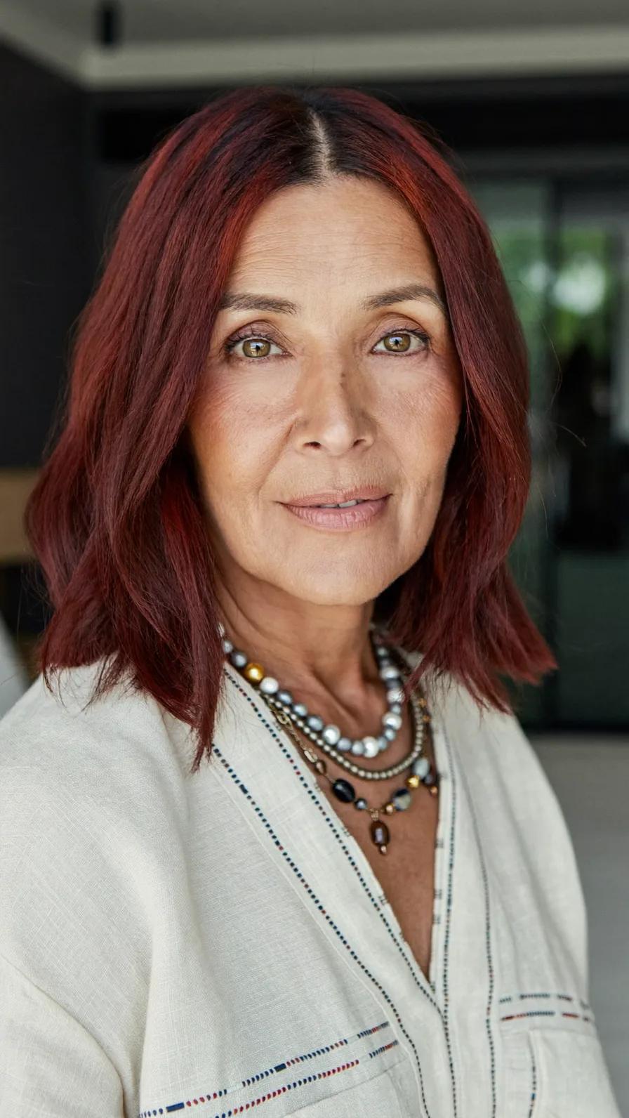 Classic Medium-Length Auburn Hair with Long Layered Cut