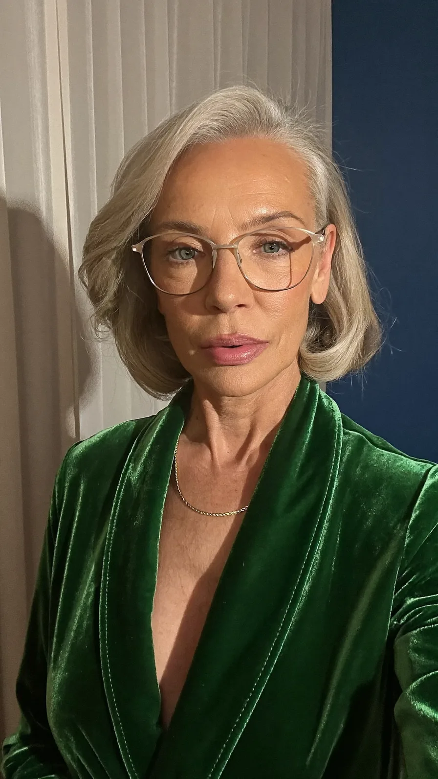 Sophisticated Chin-Length Silver Blonde Bob with Side-Swept Bangs