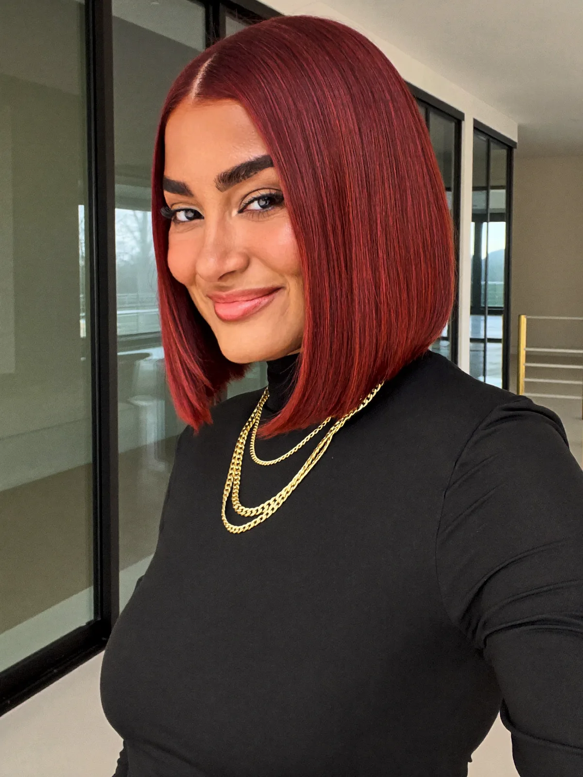 Sleek Cherry Red Blunt Bob with Middle Part for Statement Style