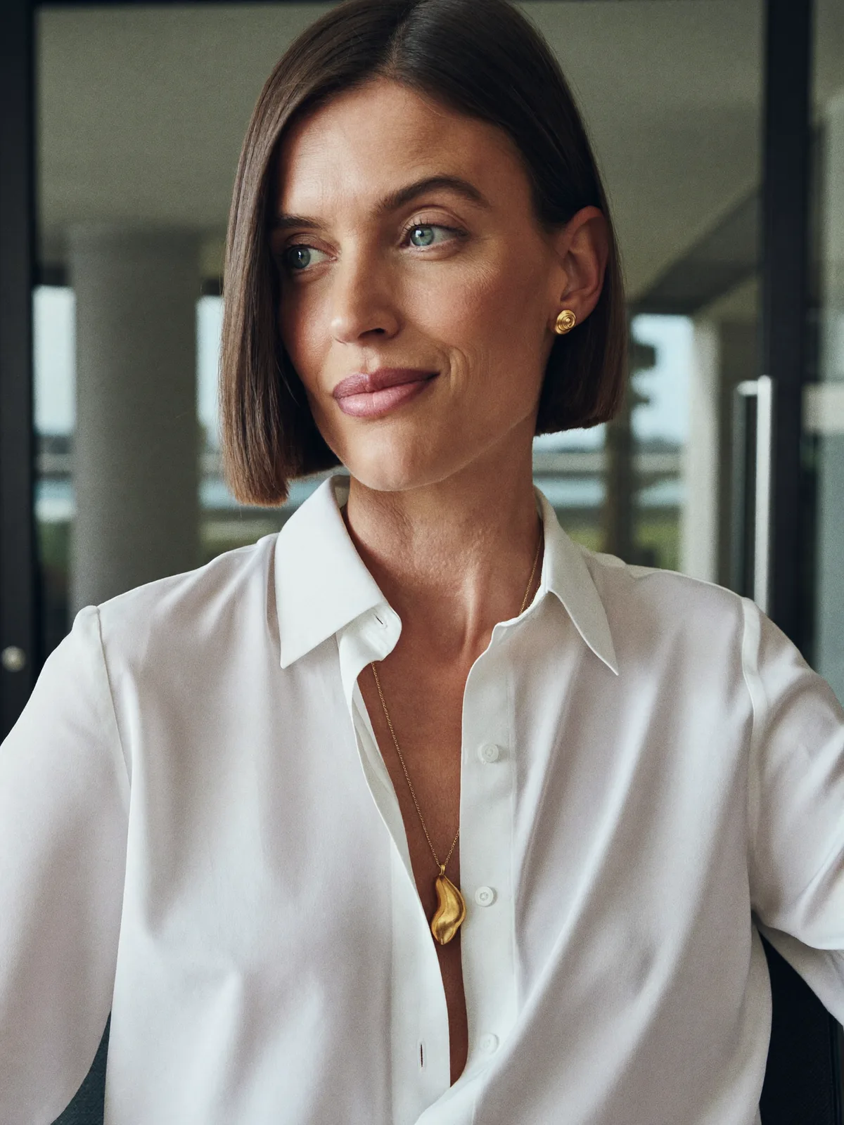 Sleek Dark Brown Blunt Bob with Precise Side Parting