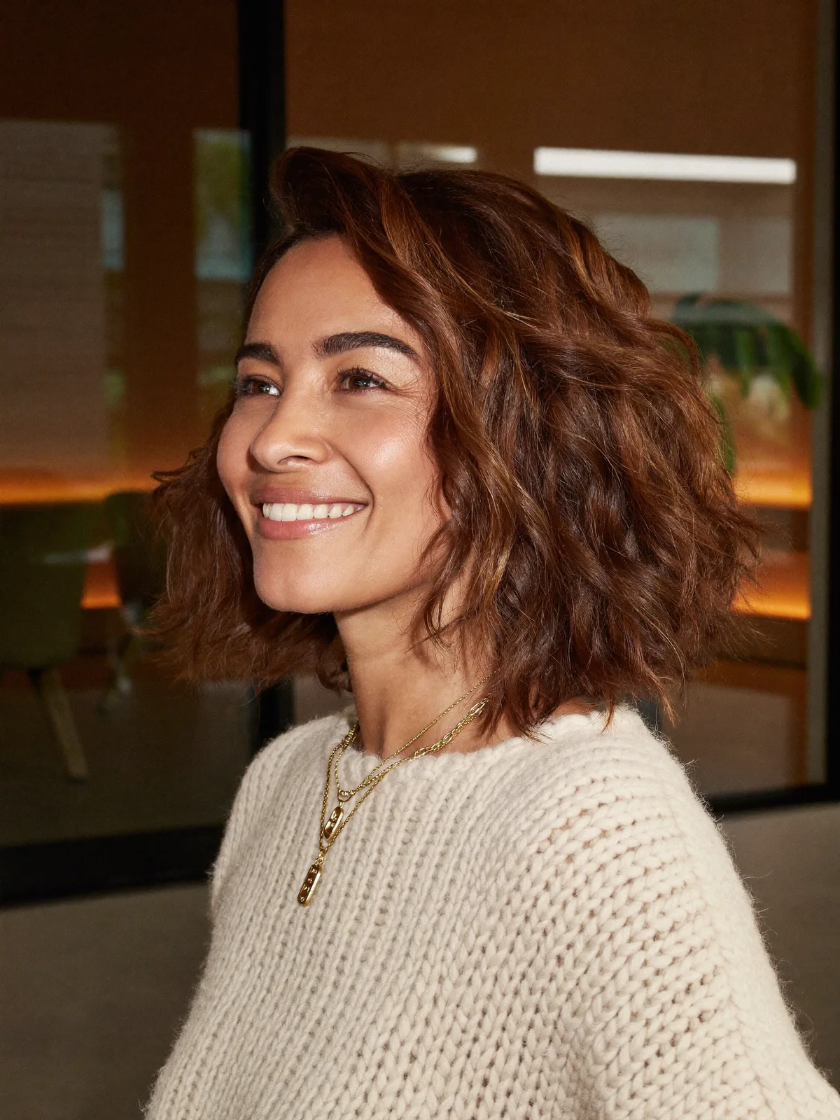 Textured Chestnut Brown Bob with Tousled Beach Waves Finish