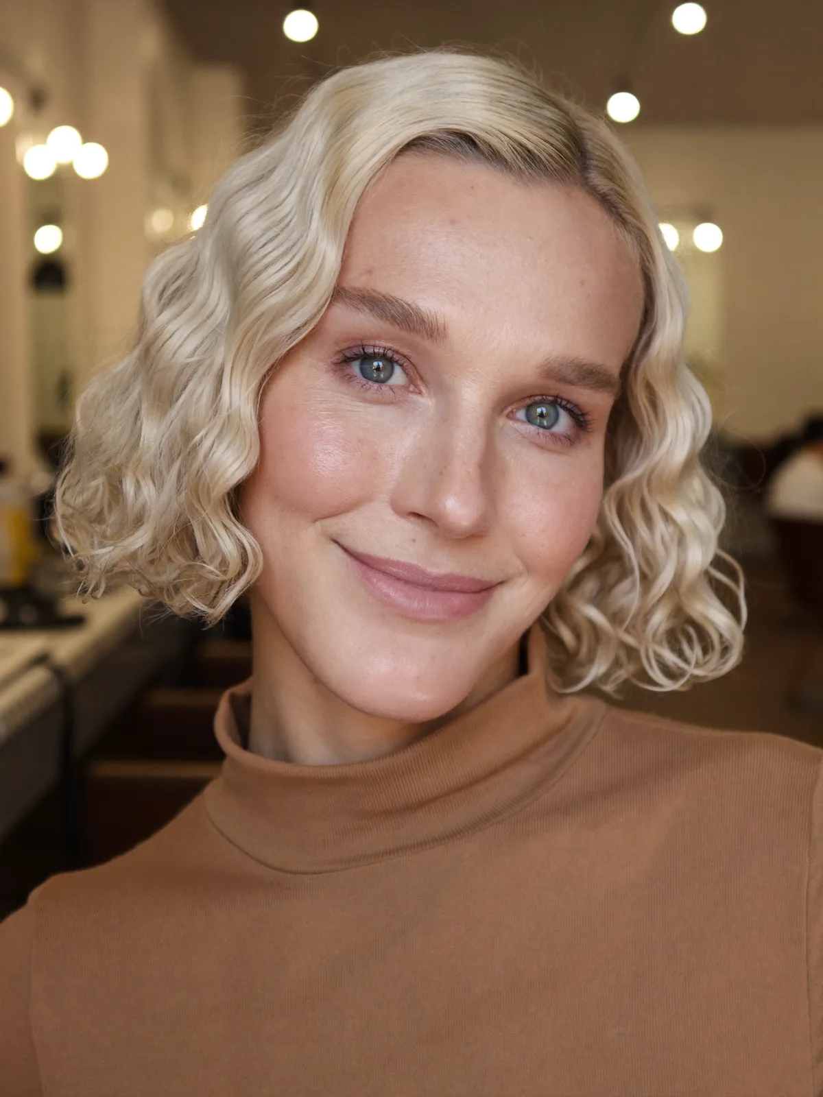 Platinum Blonde Textured Wavy Bob with Deep Side Part