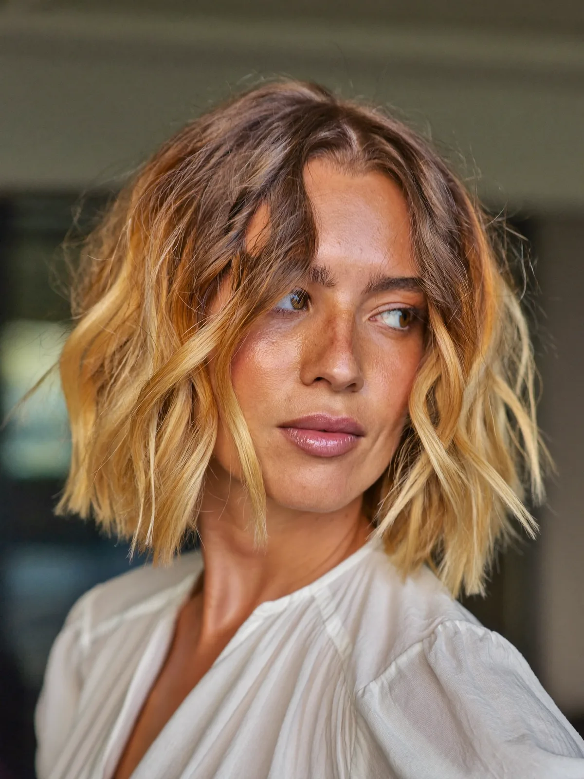 Blonde Balayage Textured Bob with Soft Waves and Middle Part
